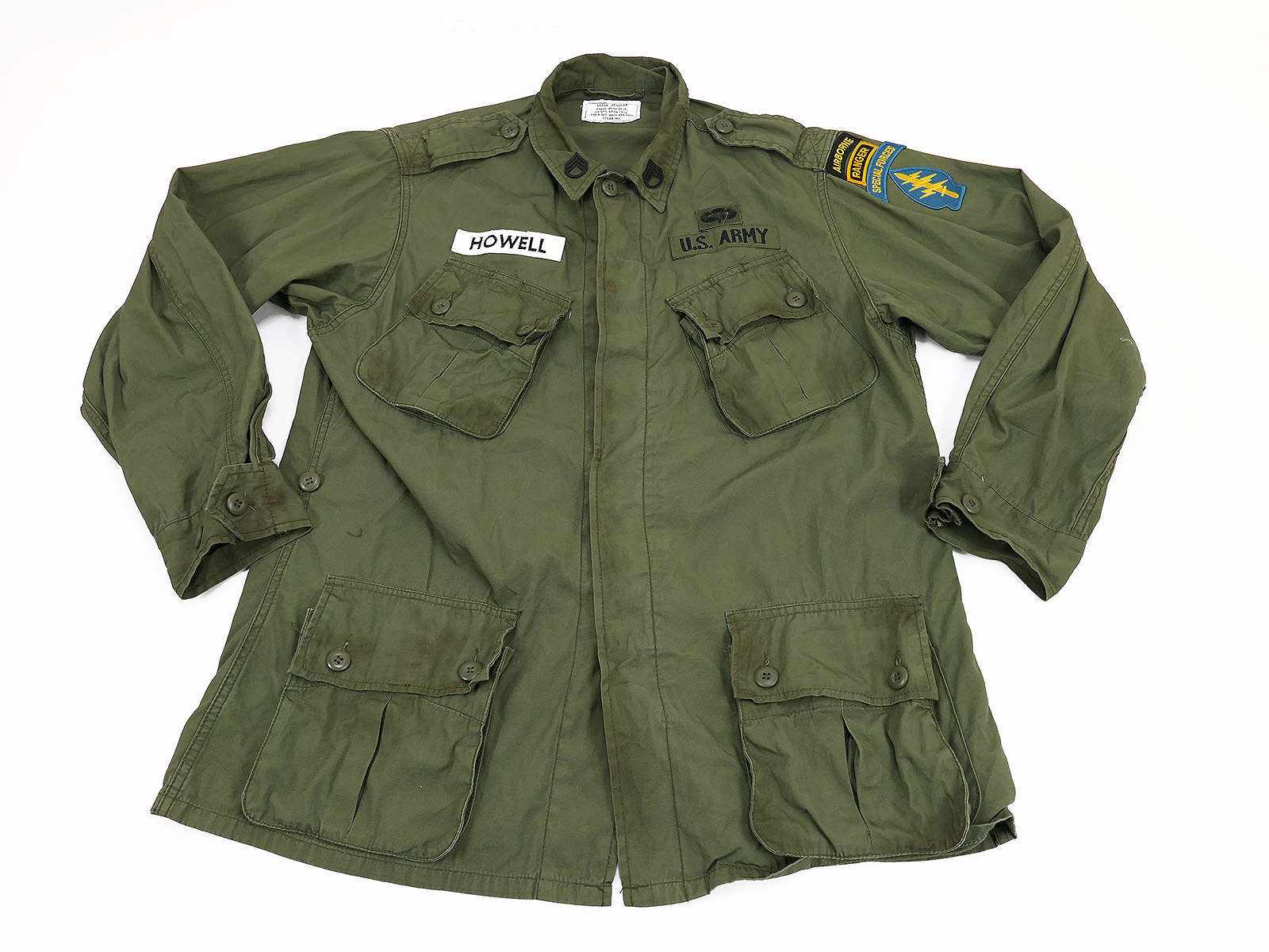 Filmrequisite Vintage US Army Feldjacke Jungle Jacket M64 mit Patches HOWELL Special Forces Vietnam oliv - Gr. Large