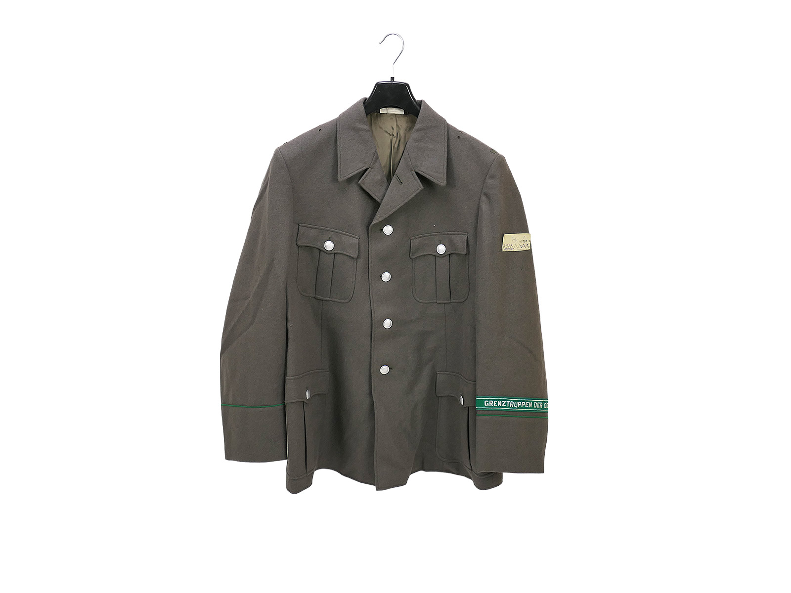 Original Uniform DDR NVA Grenztruppen mit Ärmelband Kammerstück mit Etikett